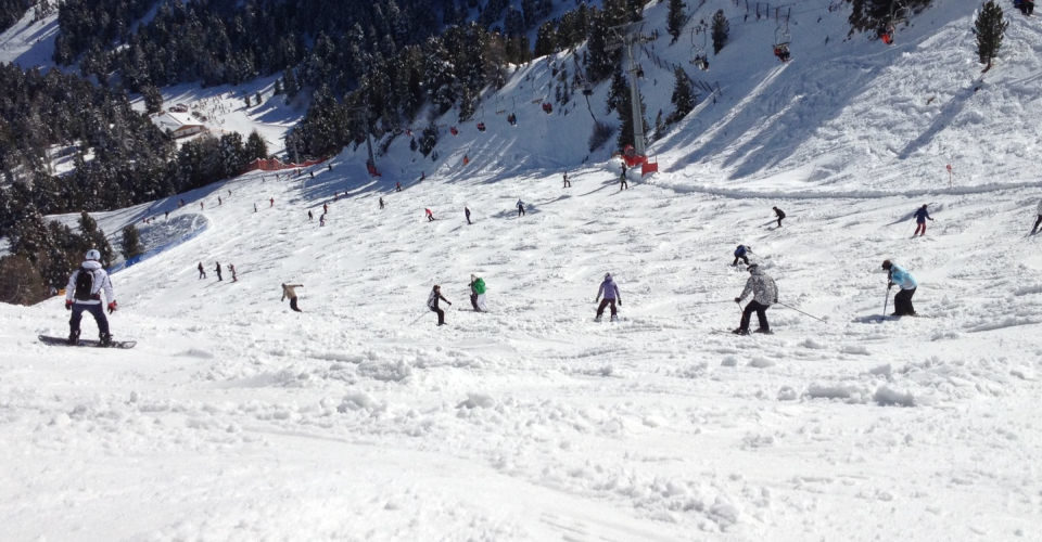 Skiing in Madonna di Campiglio is truly amazing - skiers at descent
